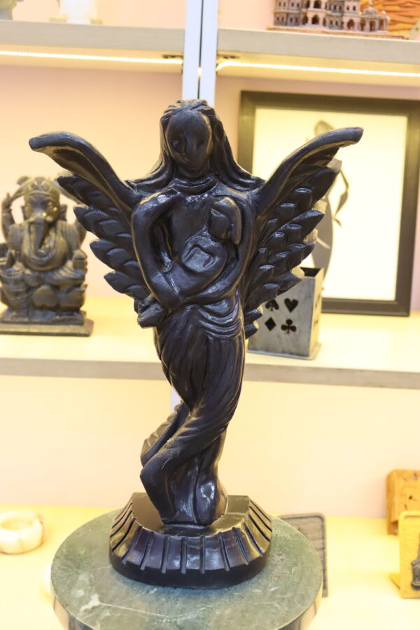 IMG_8702 An angel tenderly holding a baby black sculpture